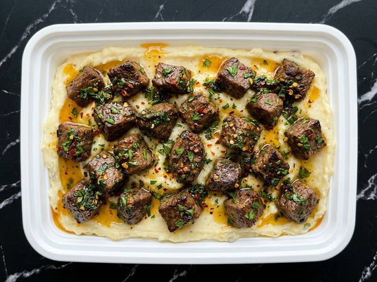 Garlic Butter Steak Bites with Mashed Potatoes & Chimichurri - Last Summer Catering